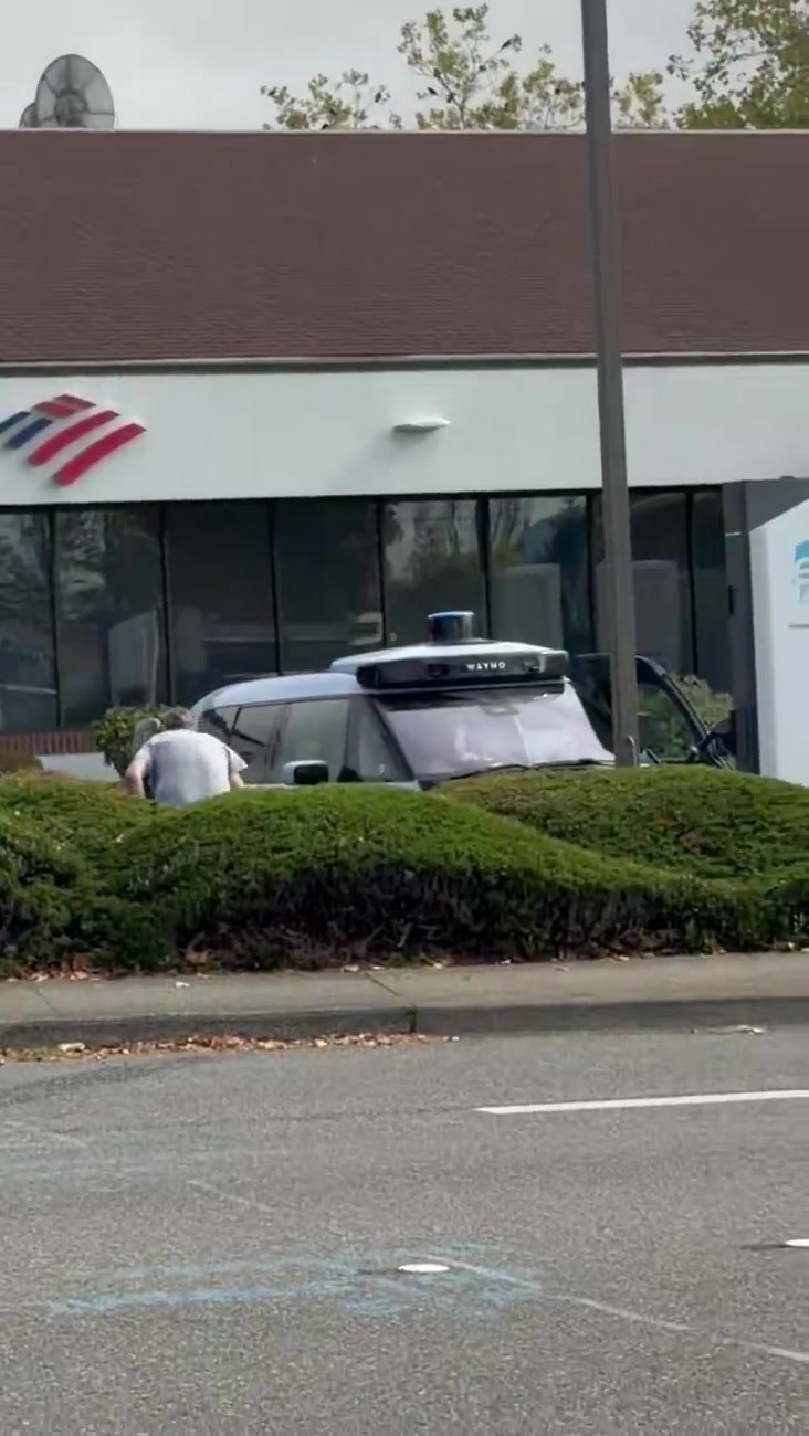 A Waymo filmed about two blocks from Tesla's Bellevue lot. Video still via @MatthewDR / X