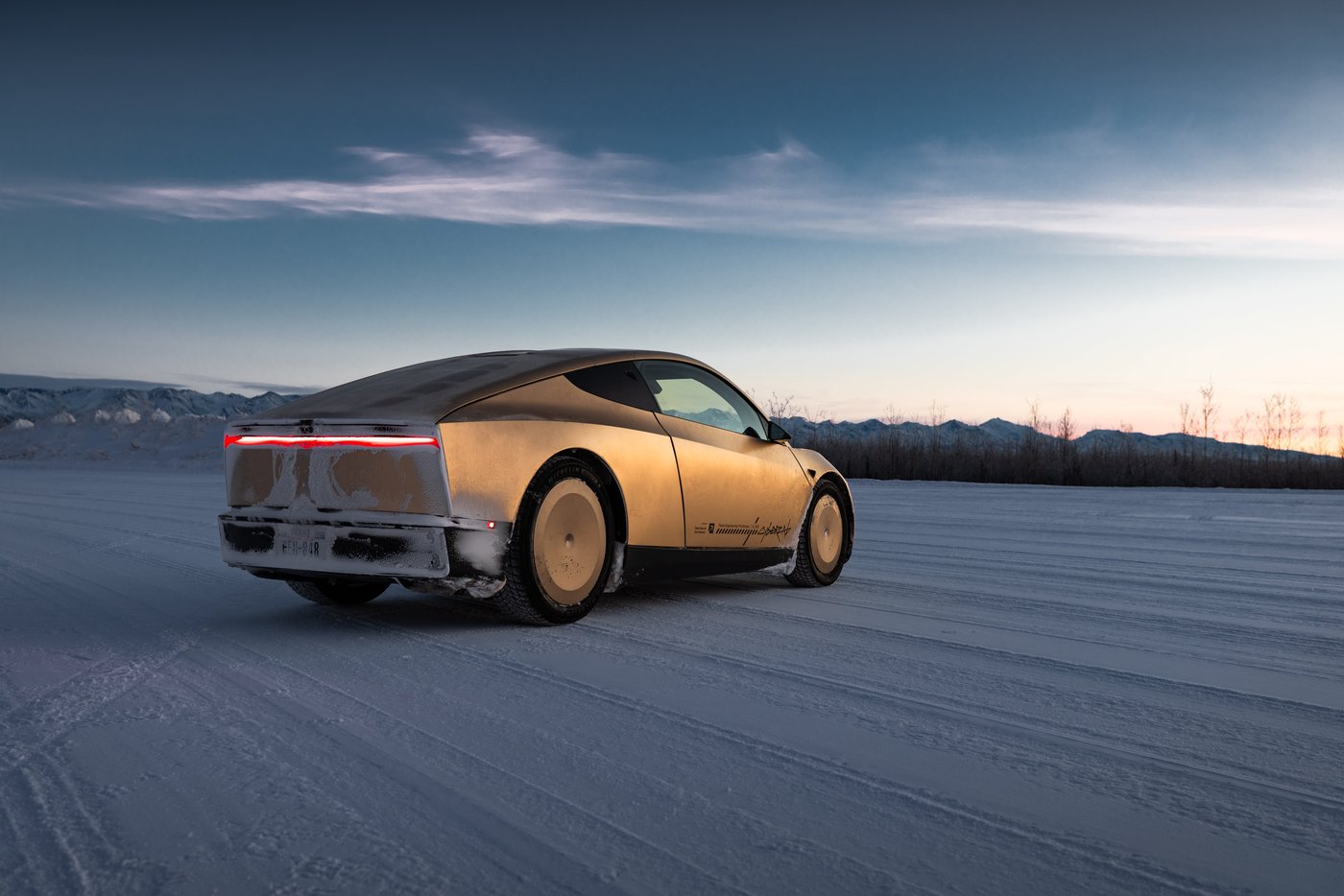 A Cybercab on packed snow during Tesla's winter testing in Alaska, shared in January. Photo via @robotaxi / X