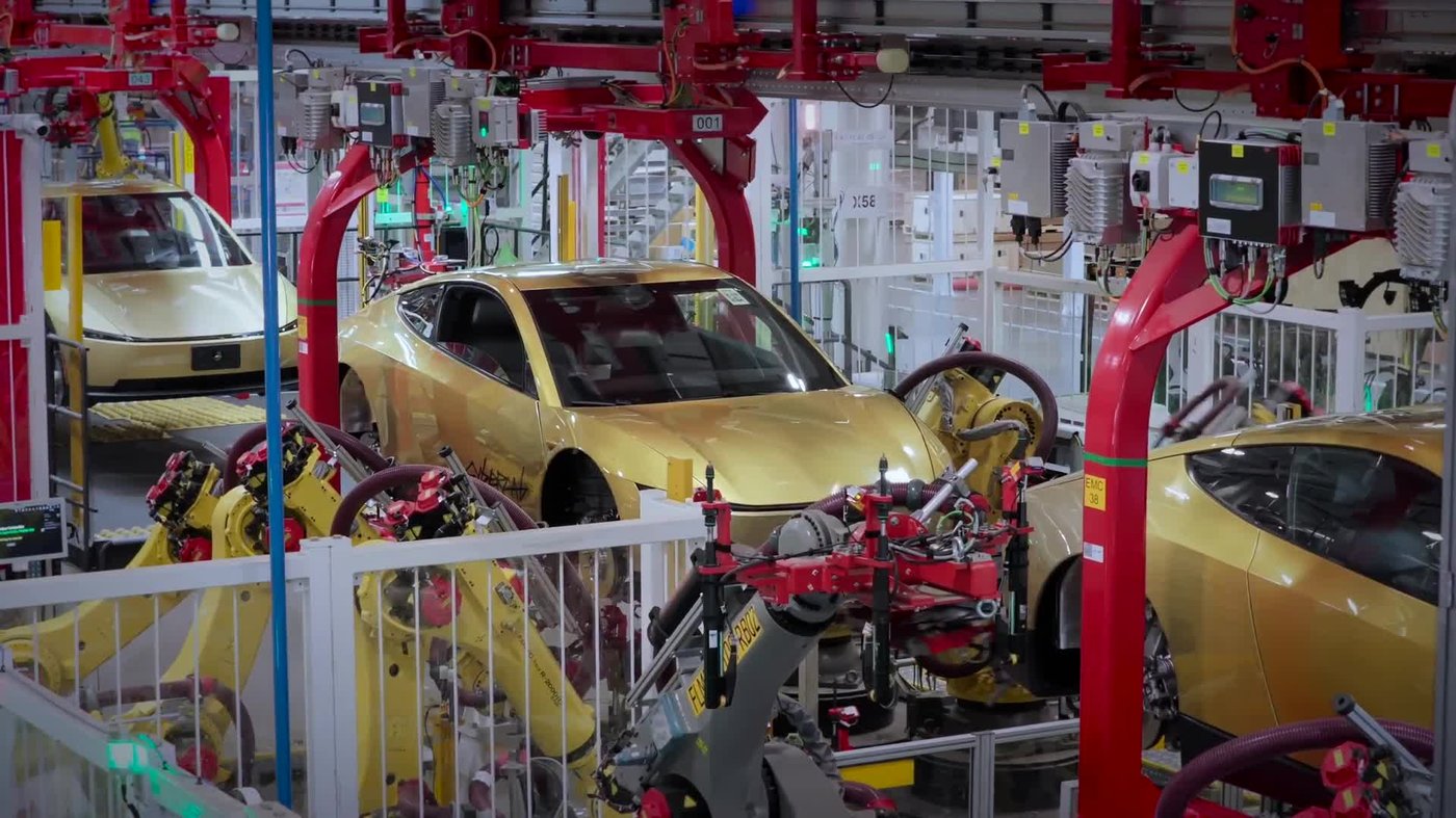 Cybercabs on the Giga Texas line in Tesla's Robotaxi fleet update video. Still via @robotaxi / X