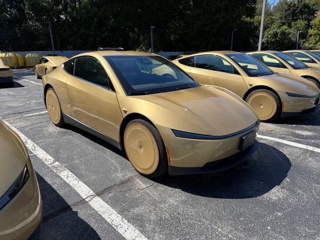 Gold Cybercabs lined in a Devon, Pa. lot.