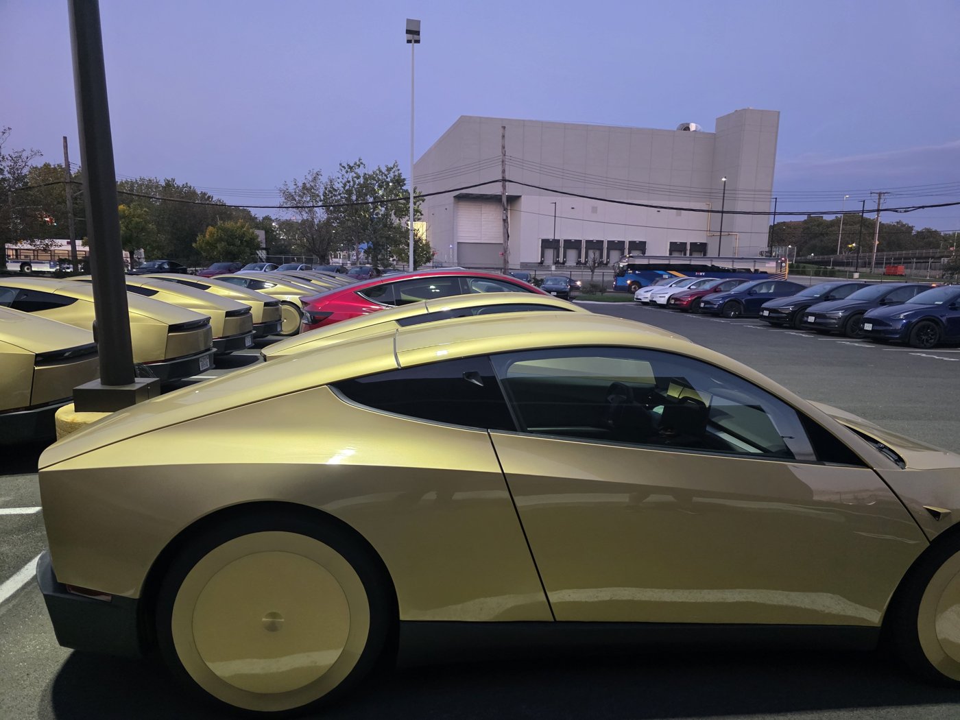 More Cybercabs parked outside a Tesla building in College Point, Queens. Photo via @Anim8Studio / X