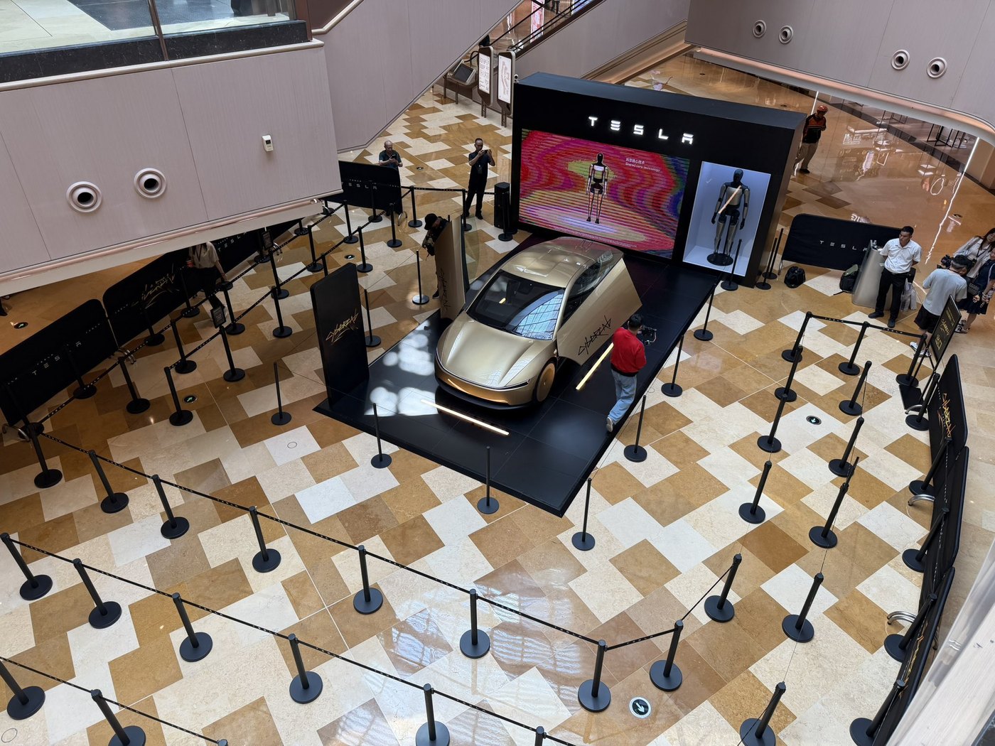 The Cybercab on display at HKRI Taikoo Hui in Shanghai during the China leg of the tour in September. Photo via @RobotaxiRadar / X