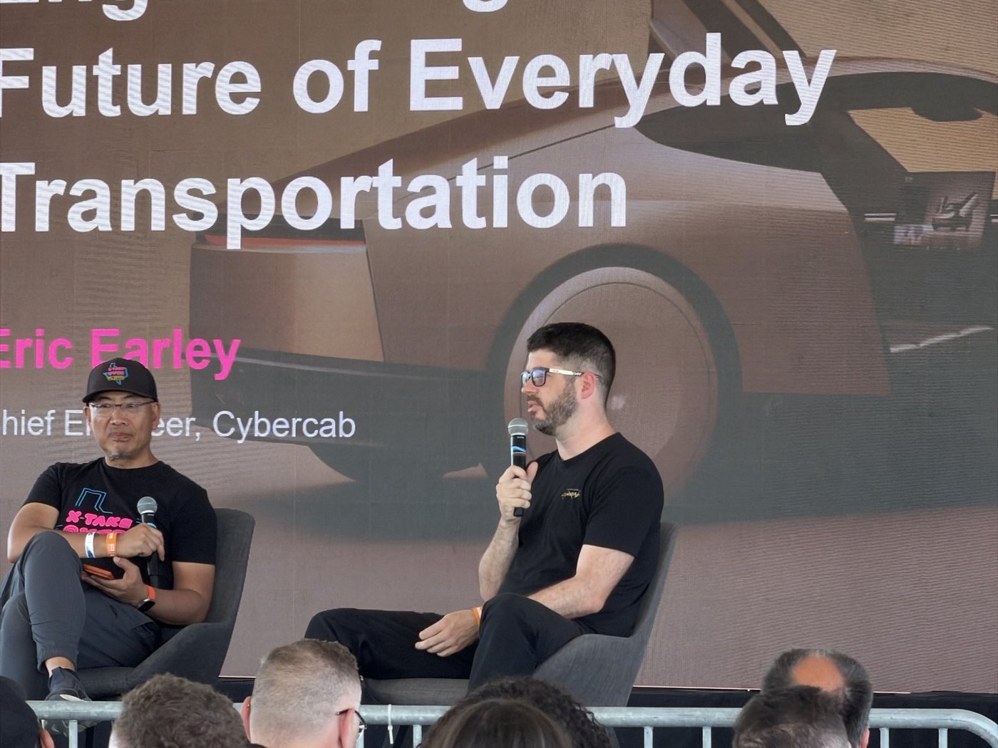 Earley's Inside Cybercab keynote at X Takeover, where he promised "very cool upgrades" to the cabin. Photo via @nikkharris / X