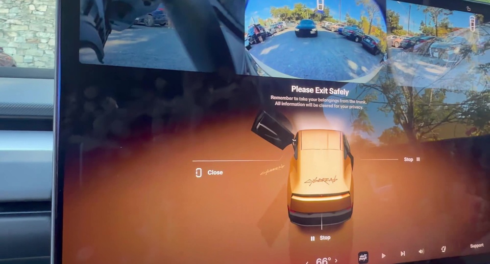 Cybercab exit screen: Please Exit Safely, with a reminder to take belongings from the trunk and a 3D car showing the hatch open. Still via @BLKMDL3 / X
